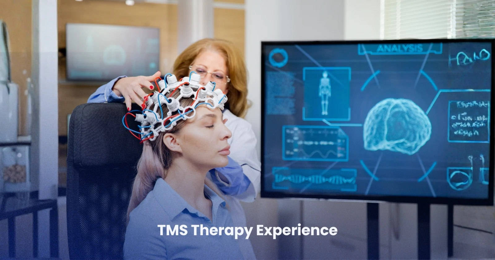 Patient receiving NeuroStar TMS therapy while a clinician monitors treatment